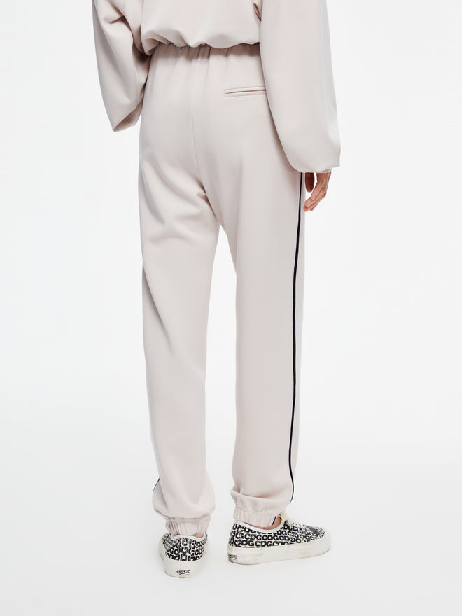 Pantalon à cordon passepoilé beige et blanc