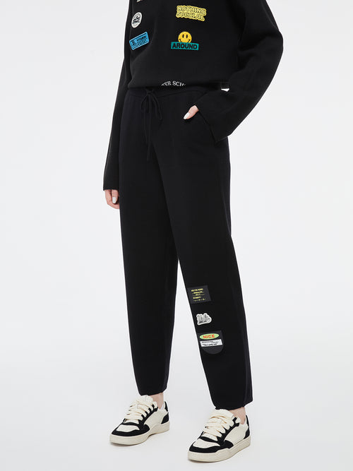 サインポストニットパンツ