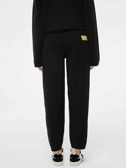 サインポストニットパンツ