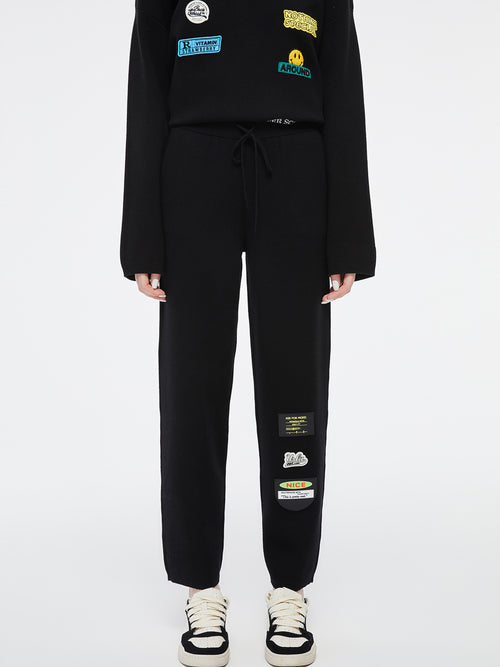 サインポストニットパンツ