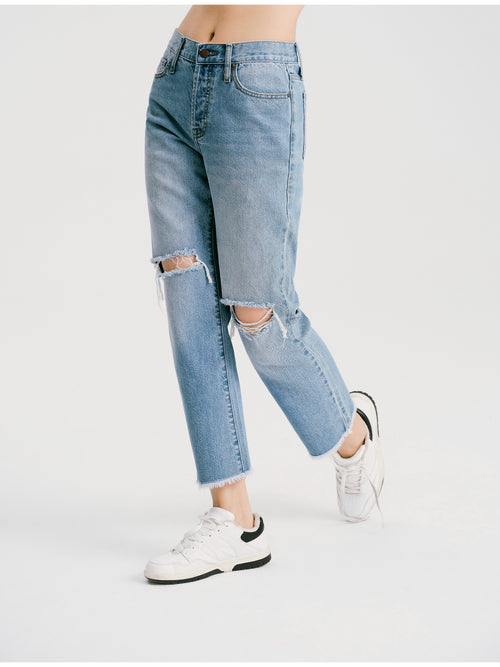 Jeans de personnalité déchirés