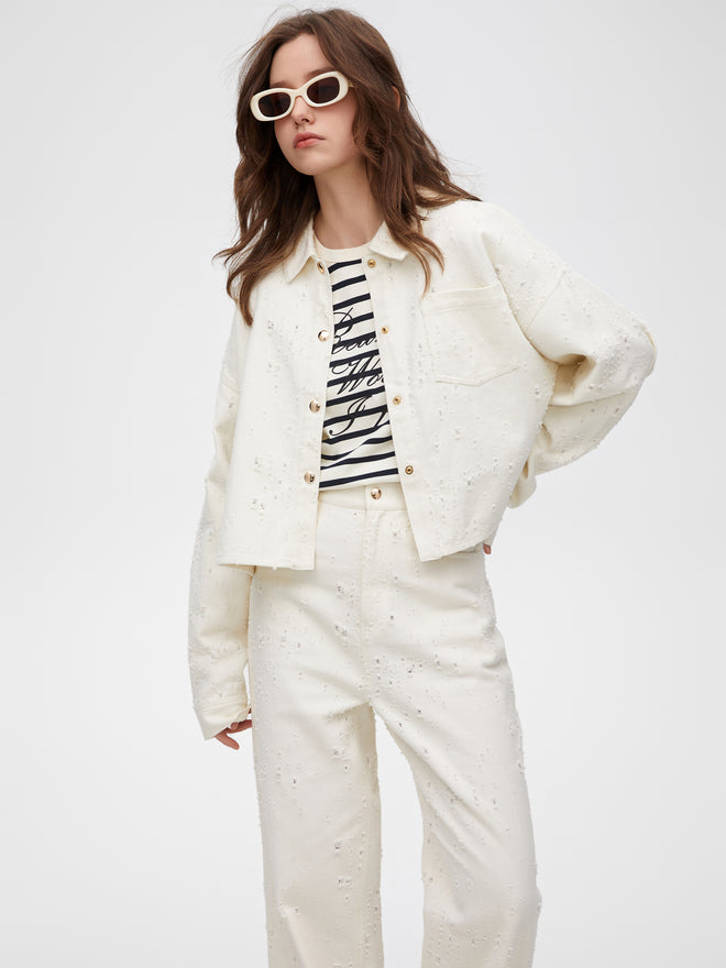 Veste en jean blanc déchiré