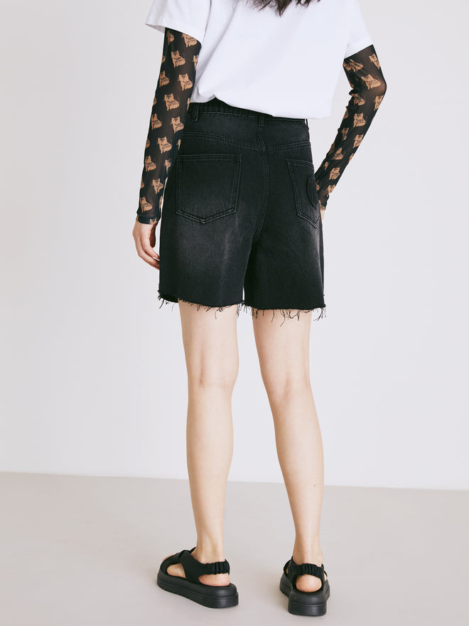 Short en denim noir à bords bruts