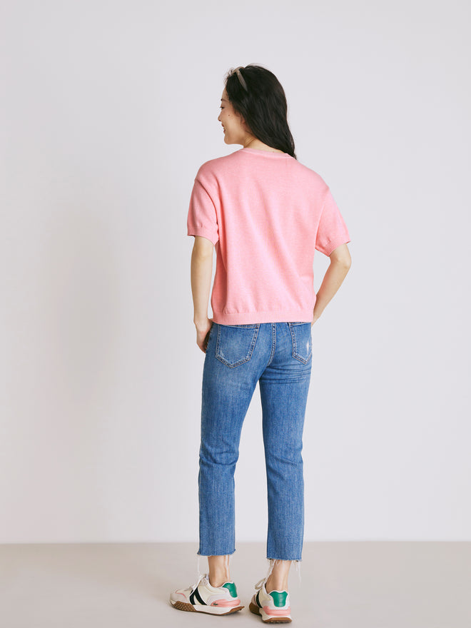 Pull en poudre gluante brodée de cœurs