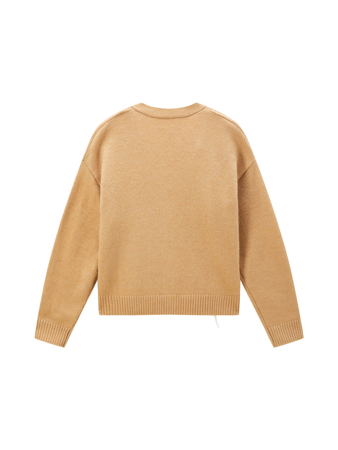 Cardigan en laine à marguerites filetées