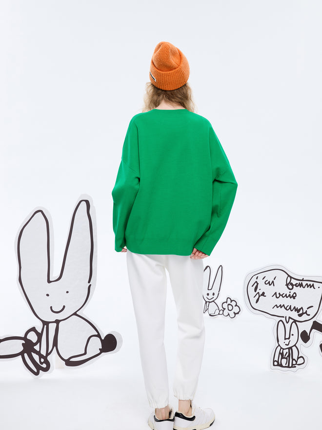くるみ割り人形のウサギの緑のセーター