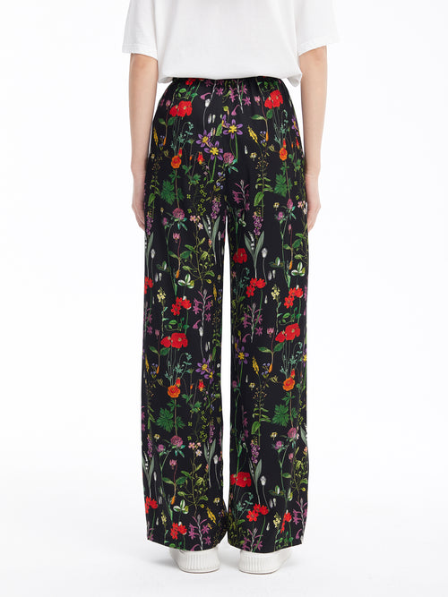 Pantalon en soie fleuri Vanguard 