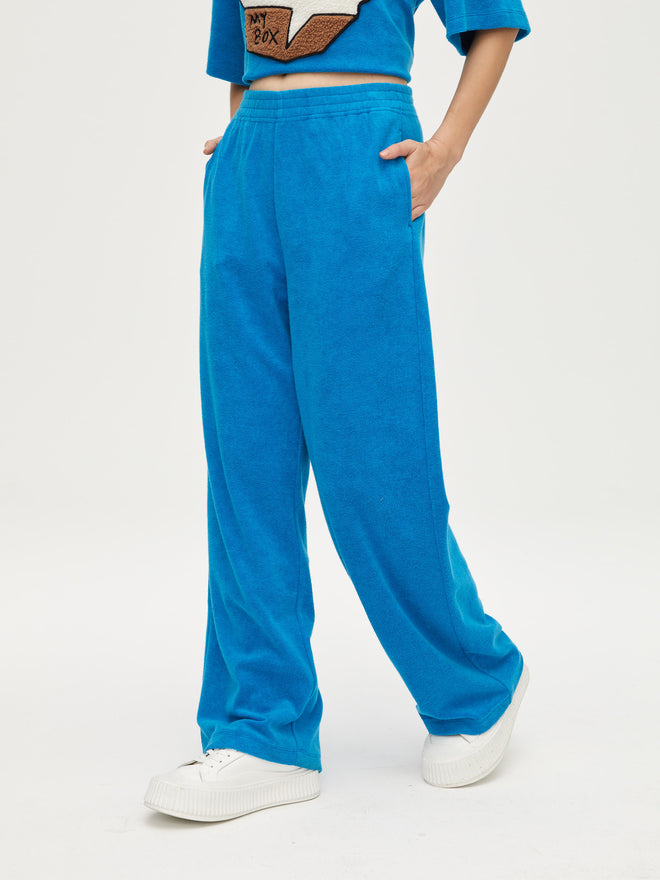 Pantalon en tricot éponge bleu paon