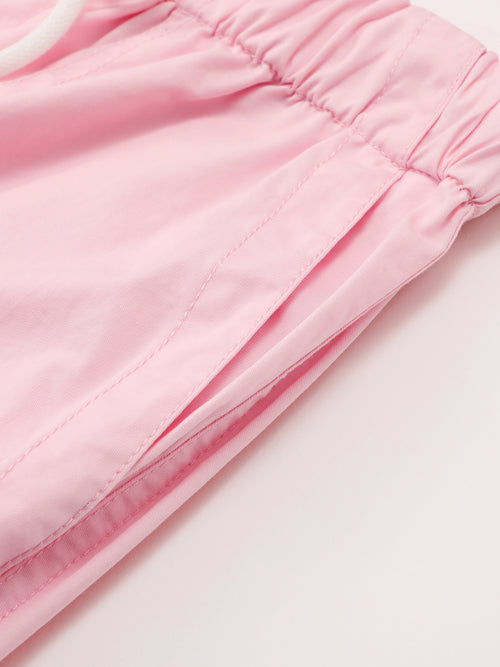 ヌードピンクのパラシュートパンツ