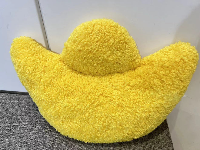 Oreiller en peluche poupée dorée